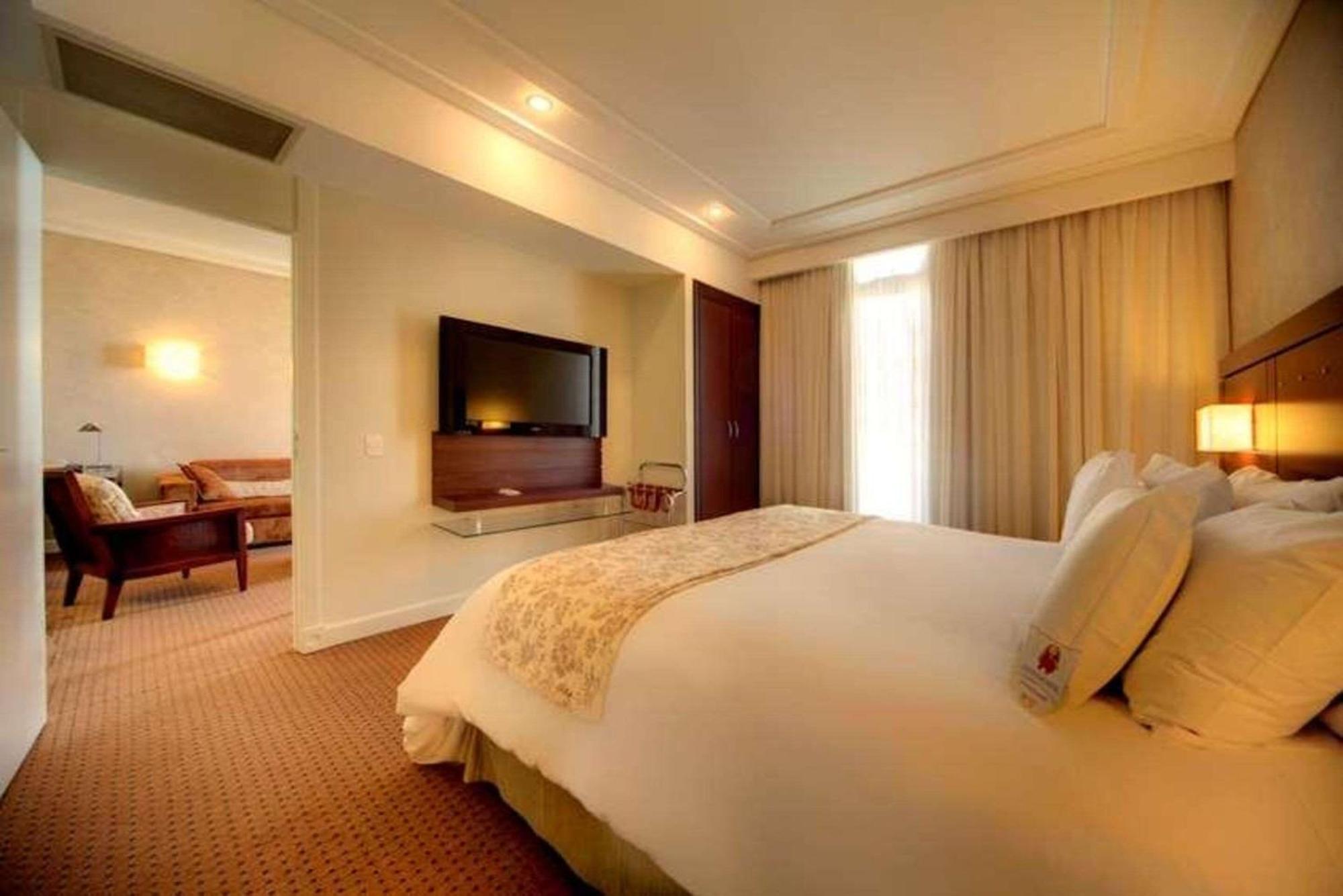 拉迪森库里蒂巴酒店 库里提巴 外观 照片 A bedroom at the hotel